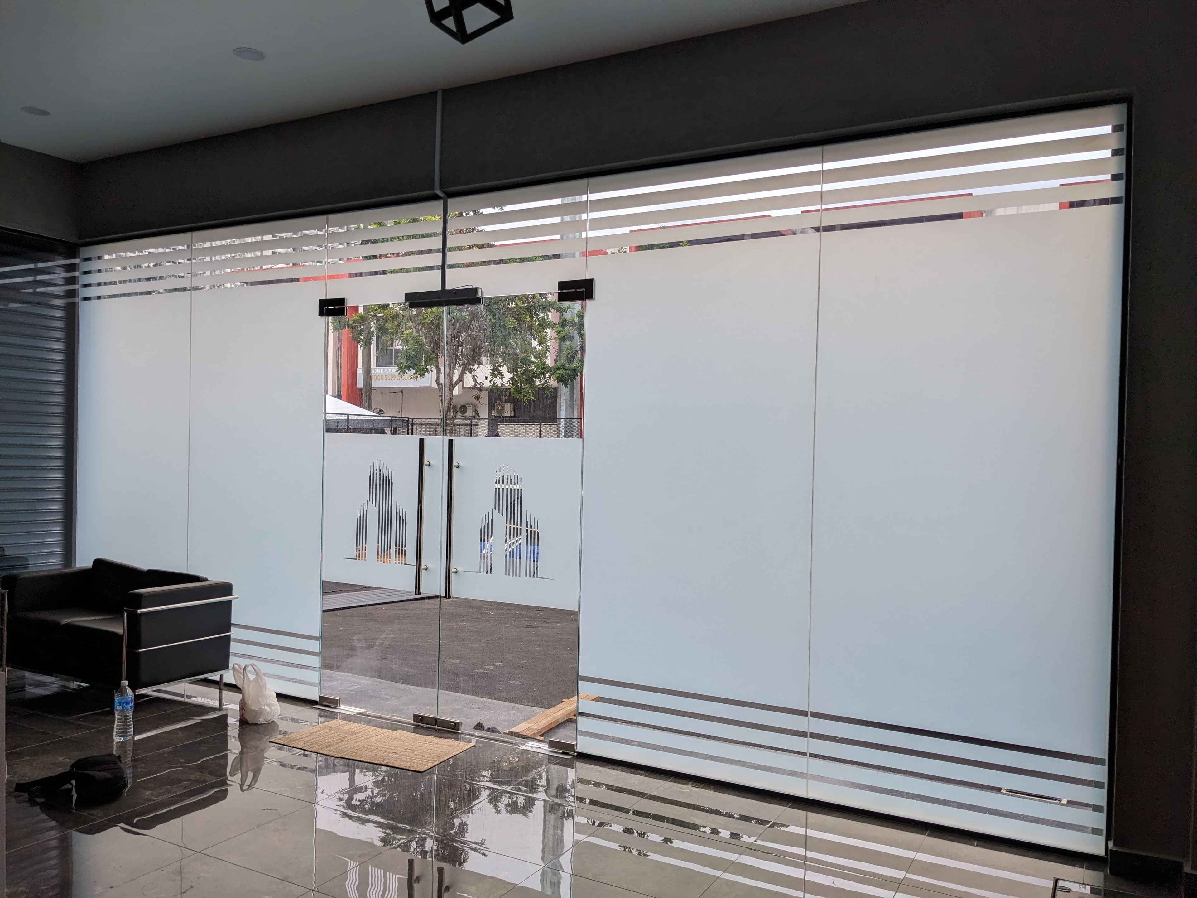 Office Tint Installation — Setapak, Kuala Lumpur  - A mix of Nano Carbon and Frosted tint films for workspaces and meeting rooms, creating a modern aesthetic with maximum privacy.